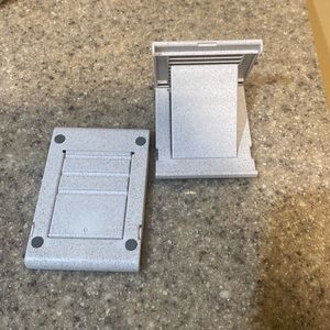 Cell phone stands. Fold up. New without tags
